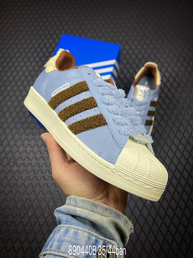 B Adidas Originals Superstar This shoe features a design popular in recent years