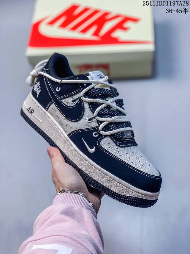 Stuart collaboration, classic brown, white, silver trim, black swoosh, and gold