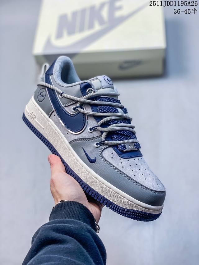 Stuart x Nike Air Force 1 '07 Low collaboration, featuring a classic blue, whit