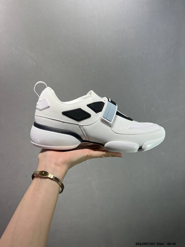 Prada America'S Cup sneakers. Redesigned with new materials and colors, these n