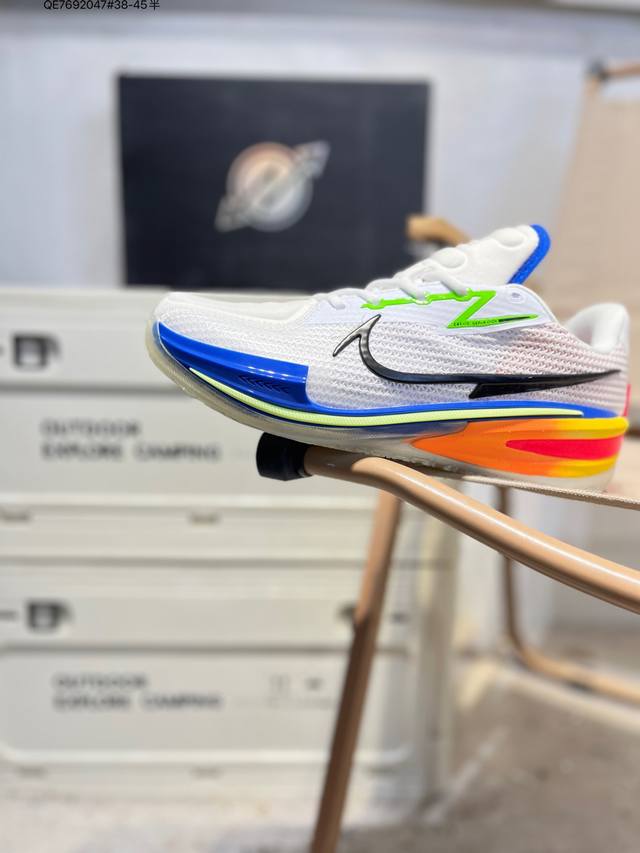 Nk Air Zoom GT Cut basketball shoe features a multi-color patchwork design. The