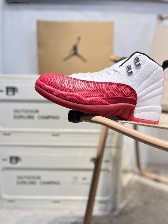 The Air Jordan 12 Stealth (AJ12) features a cool grey-silver, white, and cool gr