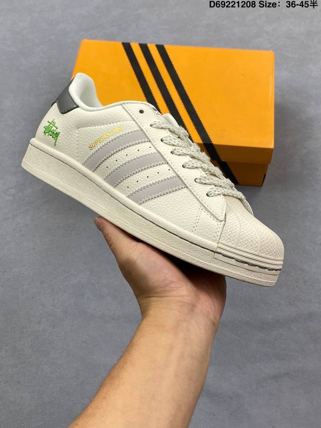 Adidas Originals Stuart collaboration white and grey classic shell toe, official