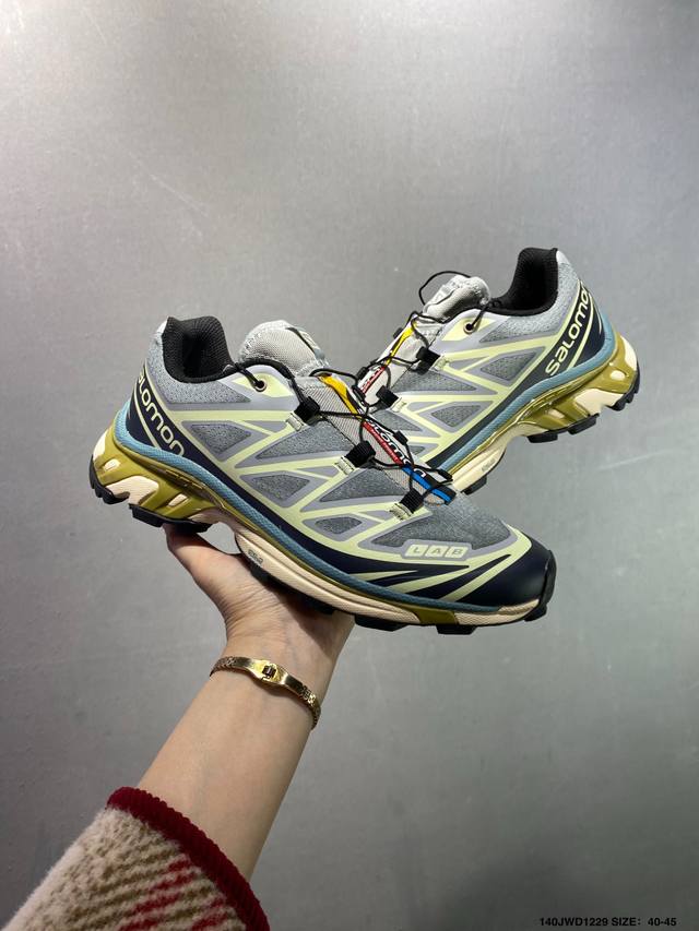 Company-grade Salomon XT-6 outdoor trail running shoes. The upper features Sens