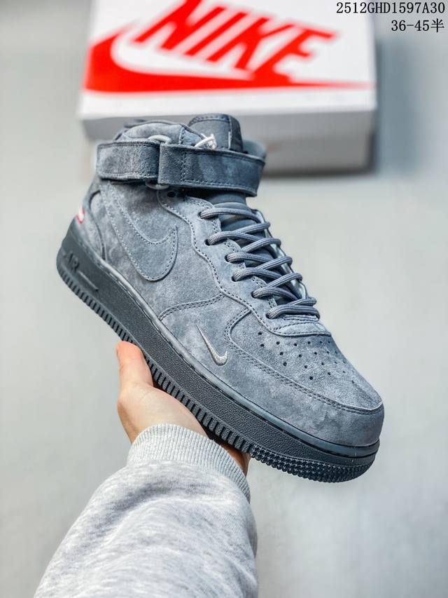 A textured explosion of grey suede! The Supreme x Nike Air Force 1 Mid collabora