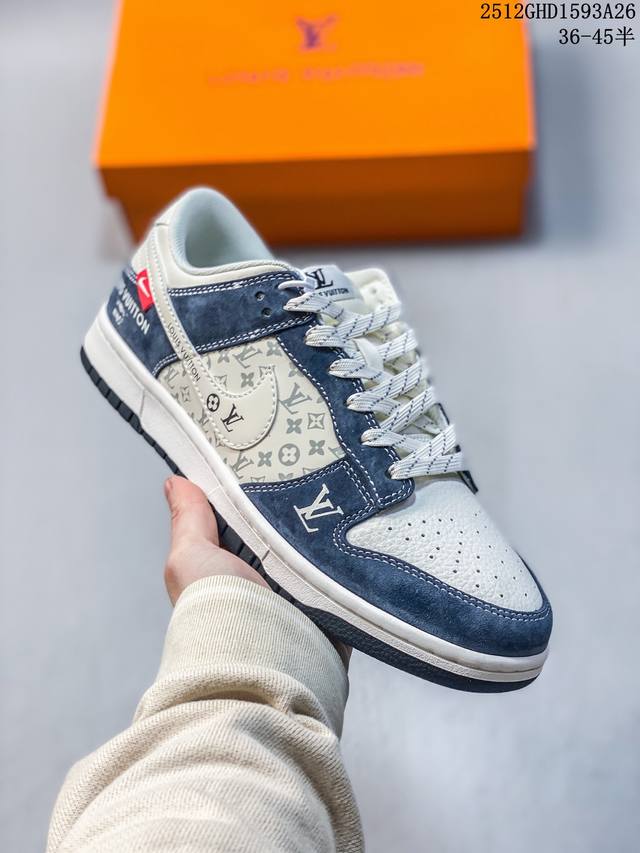 The Nike Dunk Low x Louis Vuitton collaboration in navy blue monogram colorway