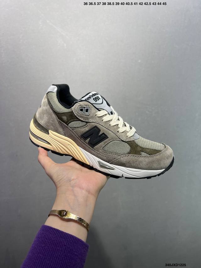 Company Grade New Balance NB991 Presidential Retro Running Shoes. The upper is