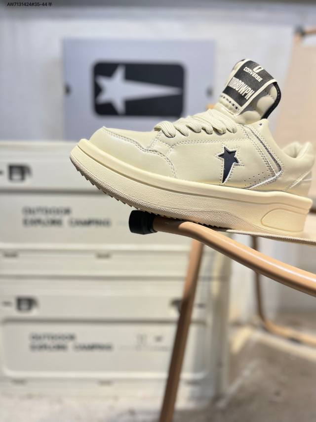 Guangdong-made Converse high-top sneakers . A fusion of dark punk rock aestheti