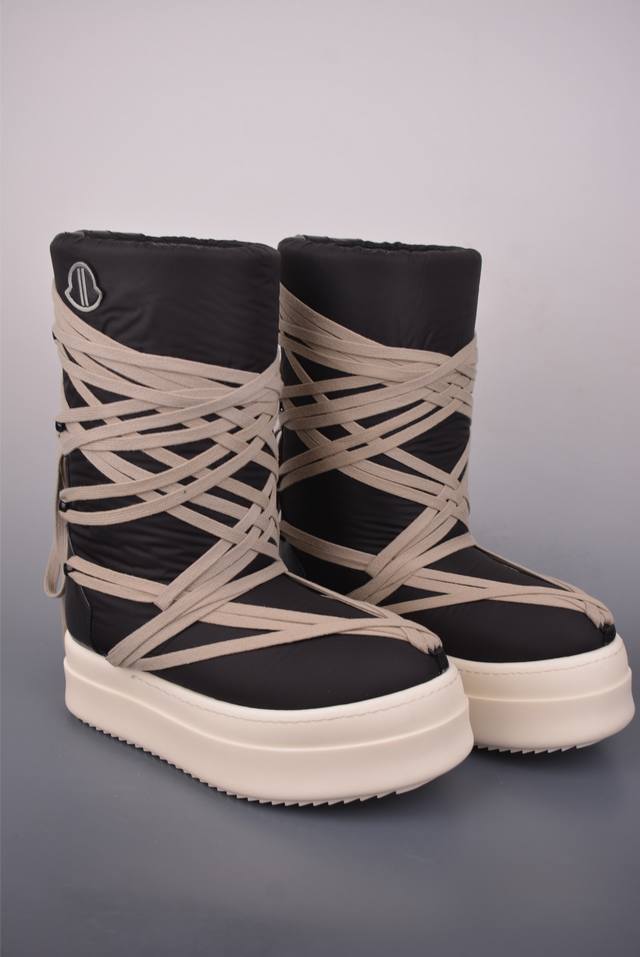 Moncler Collaboration with Rick Owens Drkshdw. These are high-top ski boots fea