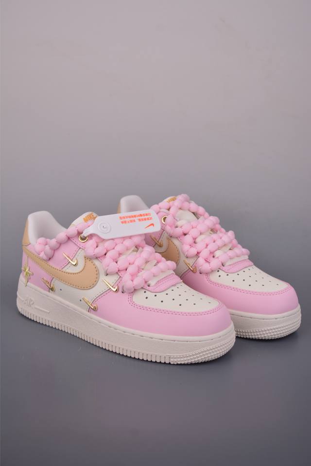 Nike Air Force 1 Low, flesh pink, four-swoosh deconstructed strap design. Made