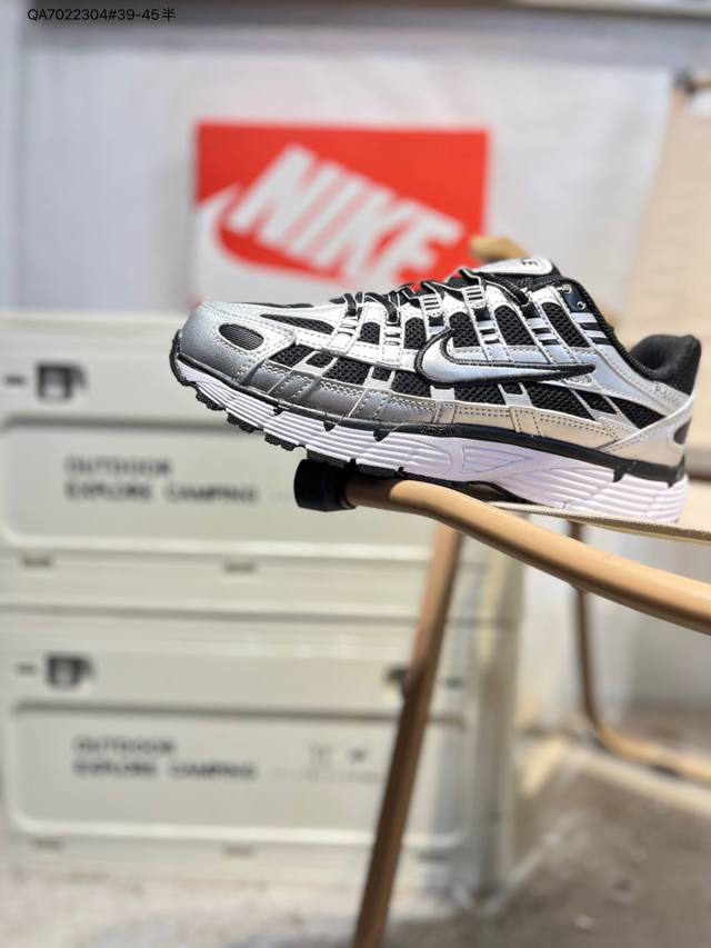 Nike P-6000 Laser Blue Retro Tech-Style Dad Shoes. The shoe features a crisscro