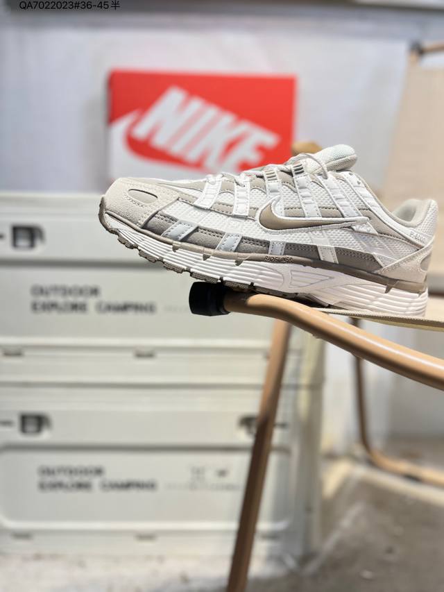 Nike P-6000 Laser Blue Retro Tech-Style Dad Shoes. The shoe features a crisscro