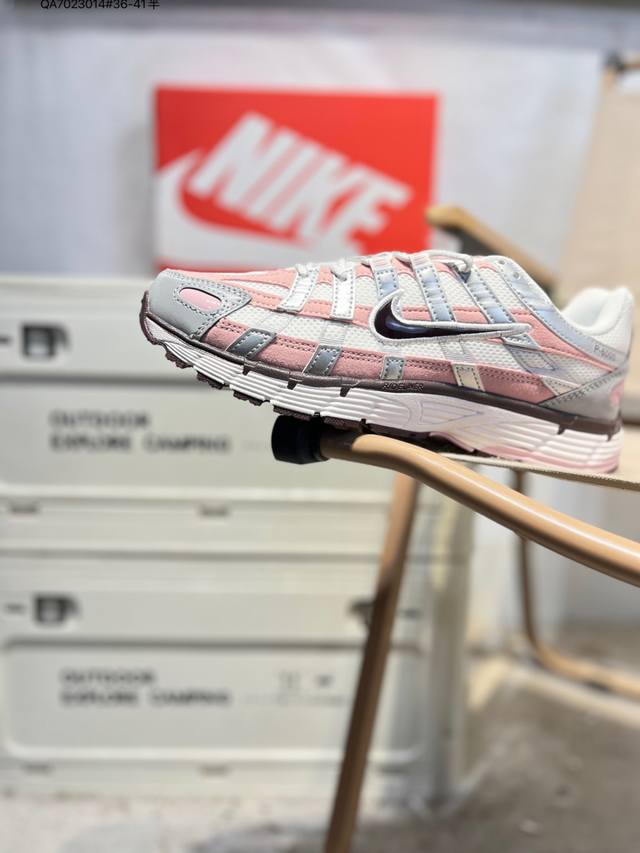 Nike P-6000 Laser Blue Retro Tech-Style Dad Shoes. The shoe features a crisscro