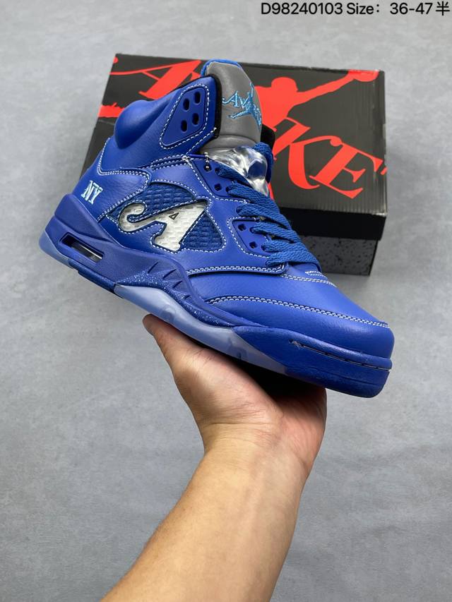 Jordan Air Jordan 5 Retro. This mid-top basketball shoe boldly uses a combinati