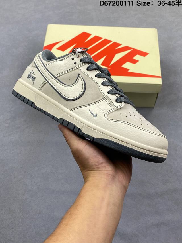 The Stussy x Nike Dunk SB Low is a collaboration between Stussy and Nike. The u