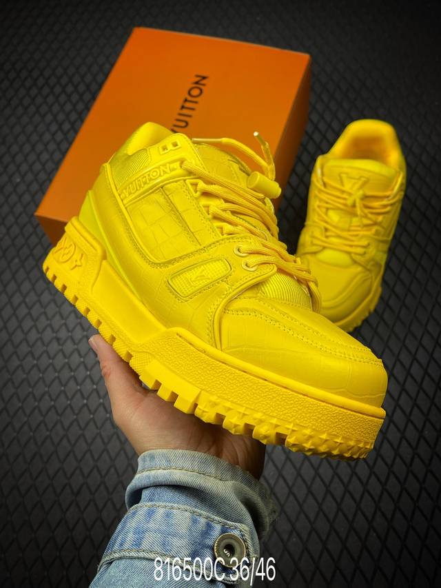 DDD Louis Vuitton Trainer Sneaker Low features a pebbled leather upper, a TPR-co