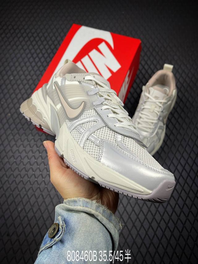 DDD Nike V2K Run Retro Item DDD Retro Dad Shoe Running Shoes. The shoe model is