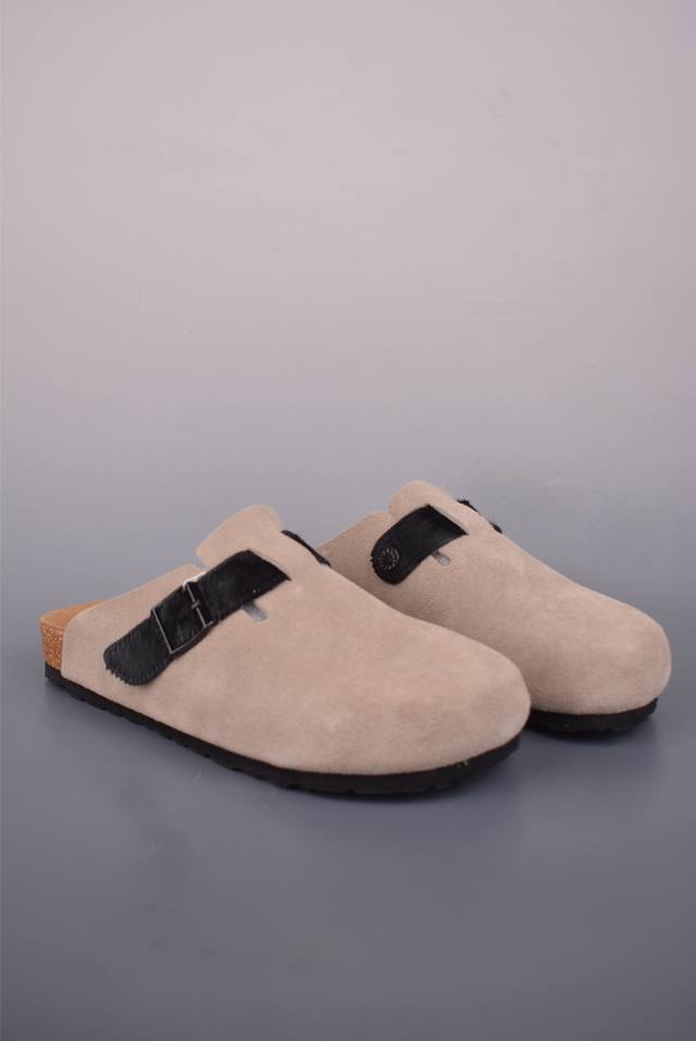 Birkenstock, a century-old German footwear brand, presents these slippers. Made